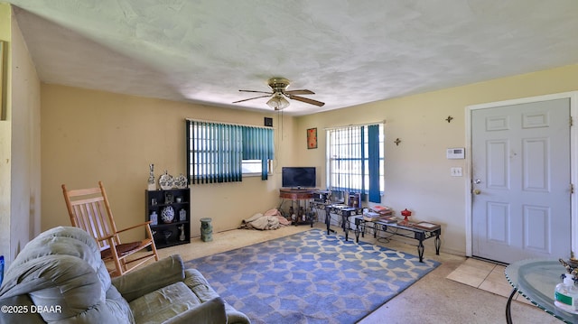 living room with ceiling fan