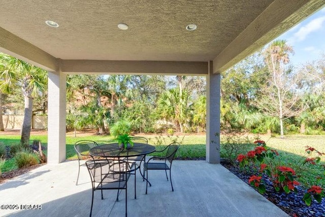 112 Chelsea Place Ave, Ormond Beach, FL 32174 - view of patio / terrace with outdoor dining space