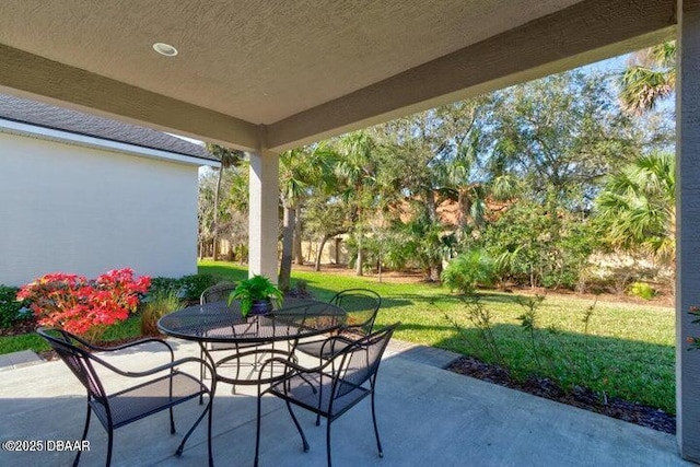 112 Chelsea Place Ave, Ormond Beach, FL 32174 - view of patio / terrace with outdoor dining space