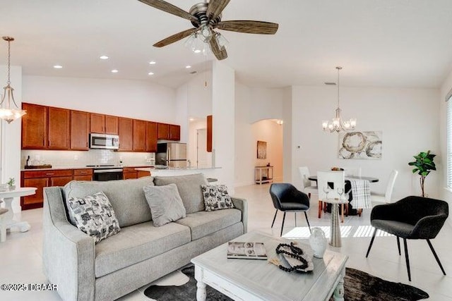 112 Chelsea Place Ave, Ormond Beach, FL 32174 - living room featuring a chandelier, ceiling fan, high vaulted ceiling, arched walkways, and recessed lighting