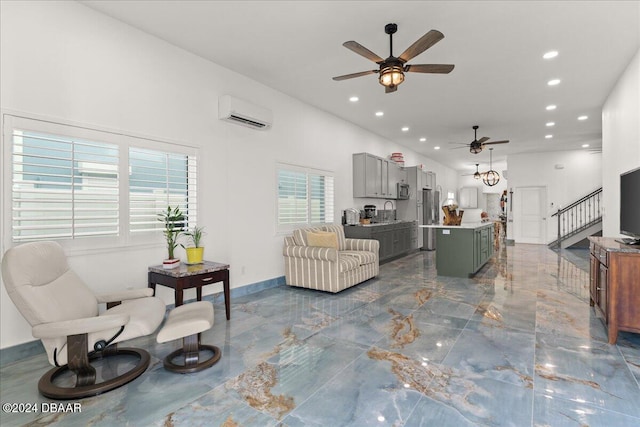 living room featuring ceiling fan, an AC wall unit, and sink