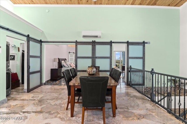 dining area featuring a barn door, a wall mounted AC, wooden ceiling, and ornamental molding