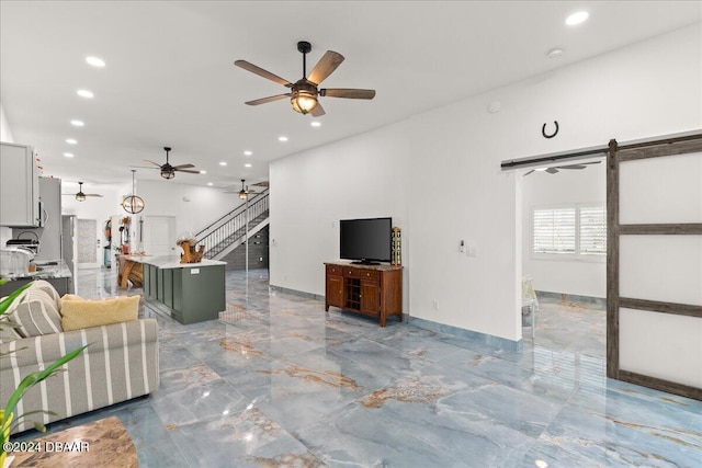 living room featuring a barn door