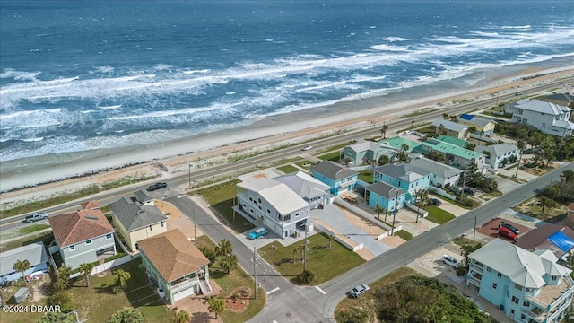 aerial view with a beach view and a water view