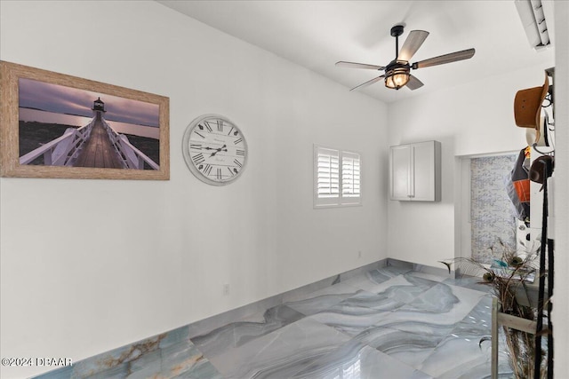 spare room featuring ceiling fan