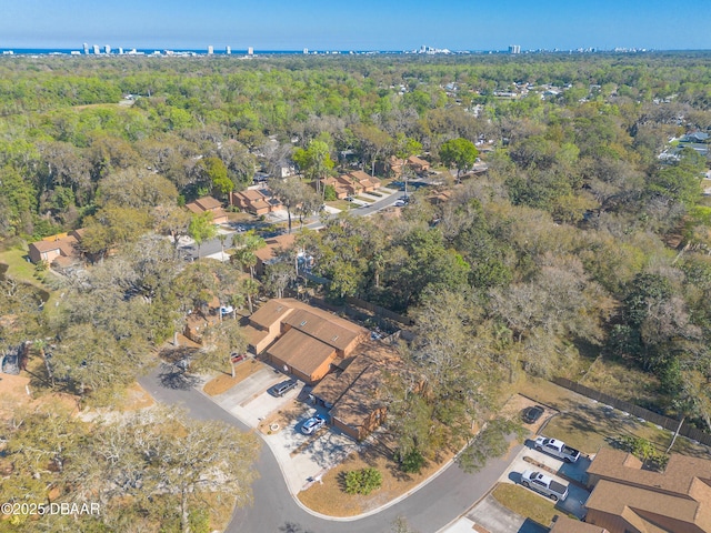 aerial view with a wooded view