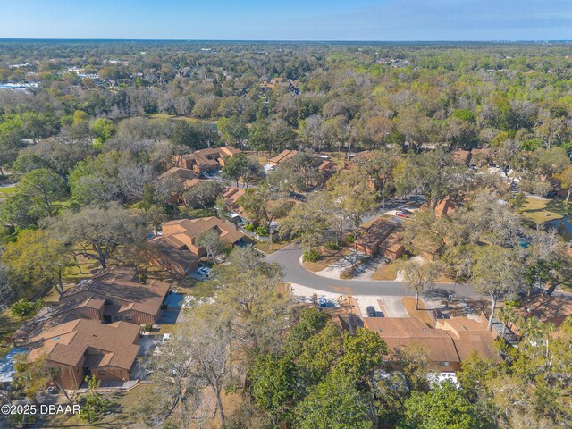 bird's eye view with a residential view and a view of trees