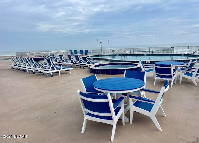 view of patio featuring a water view