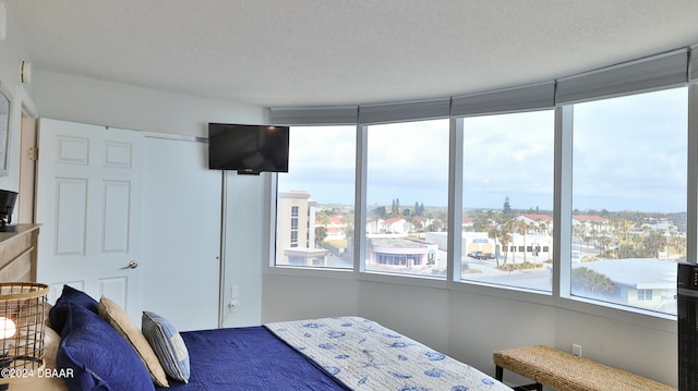 bedroom featuring a textured ceiling