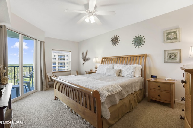 bedroom featuring light carpet, ceiling fan, and access to exterior