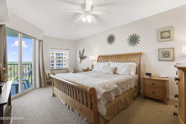 5300 S Atlantic Ave Unit 15-403, New Smyrna Beach, FL 32169 - bedroom with light carpet, access to outside, and a ceiling fan