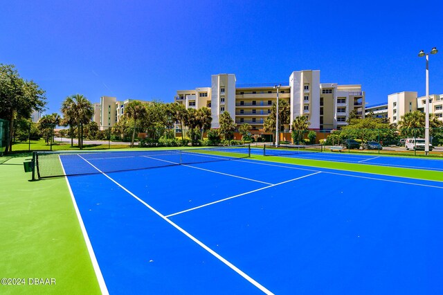 5300 S Atlantic Ave Unit 15-403, New Smyrna Beach, FL 32169 - view of tennis court with community basketball court