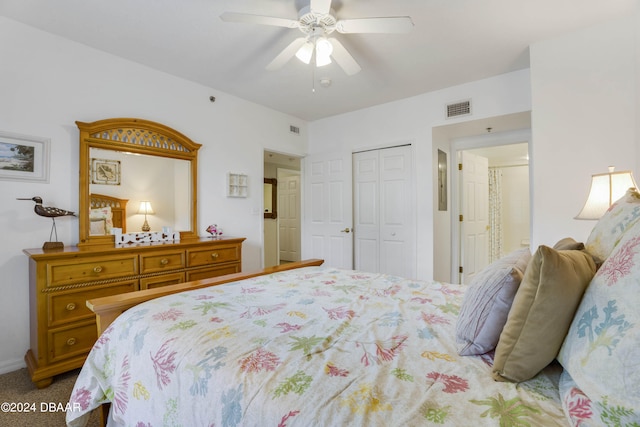 bedroom with a closet, carpet flooring, and ceiling fan