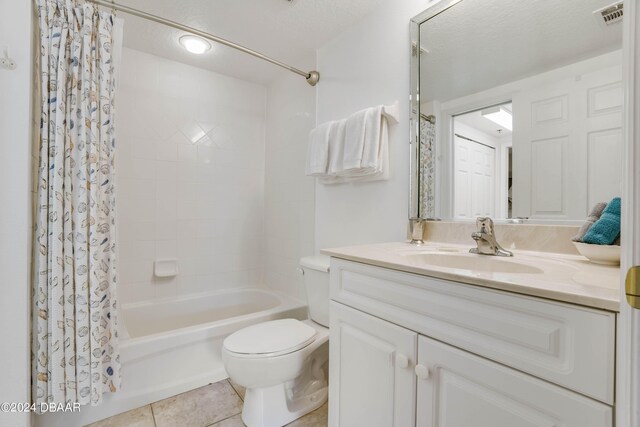 5300 S Atlantic Ave Unit 15-403, New Smyrna Beach, FL 32169 - bathroom with tile patterned floors, shower / tub combo, toilet, and vanity