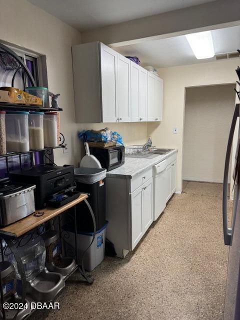 laundry room featuring sink