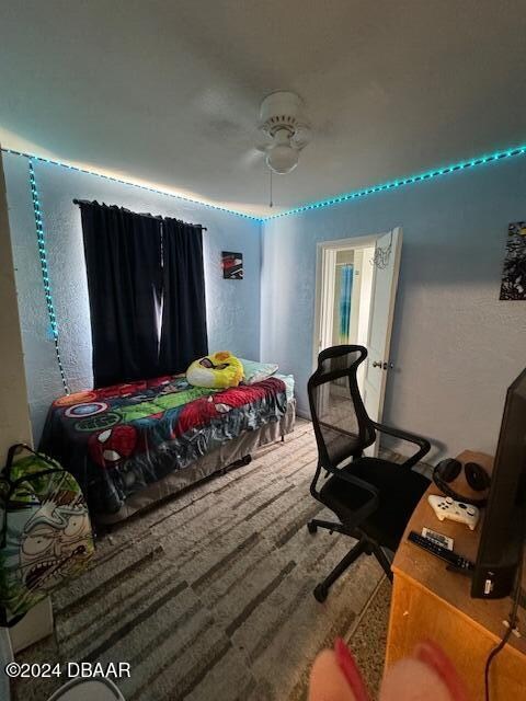 bedroom featuring ceiling fan