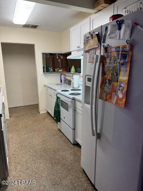 kitchen with white cabinets, stainless steel refrigerator with ice dispenser, and electric range