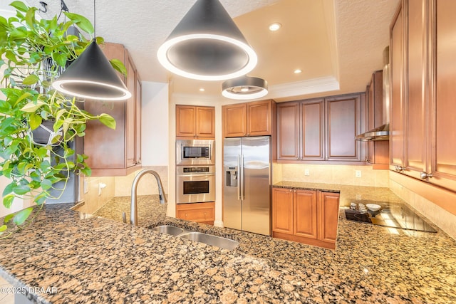 2515 S Atlantic Ave Unit 703, Daytona Beach, FL 32118 - kitchen featuring stainless steel appliances, a raised ceiling, tasteful backsplash, light stone counters, and recessed lighting