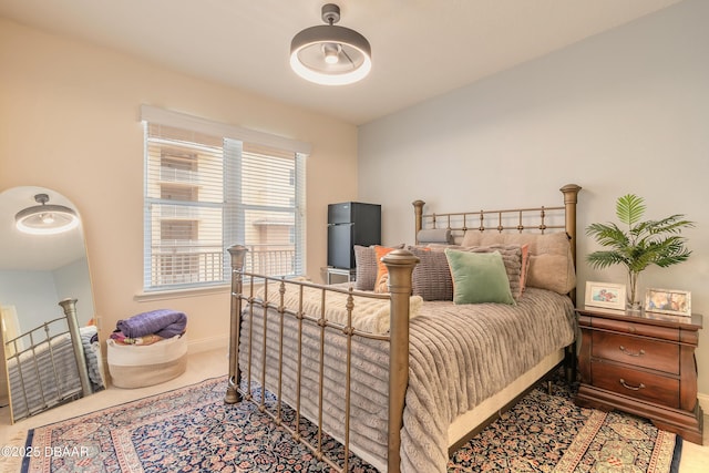 2515 S Atlantic Ave Unit 703, Daytona Beach, FL 32118 - bedroom with refrigerator and carpet floors
