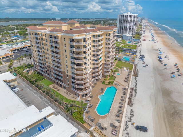 2515 S Atlantic Ave Unit 703, Daytona Beach, FL 32118 - drone / aerial view of a pool area and a large body of water