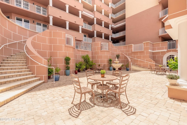 2515 S Atlantic Ave Unit 703, Daytona Beach, FL 32118 - view of patio / terrace with stairs