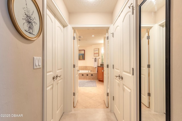 2515 S Atlantic Ave Unit 703, Daytona Beach, FL 32118 - corridor with light tile patterned floors