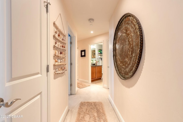 2515 S Atlantic Ave Unit 703, Daytona Beach, FL 32118 - corridor with light carpet and baseboards