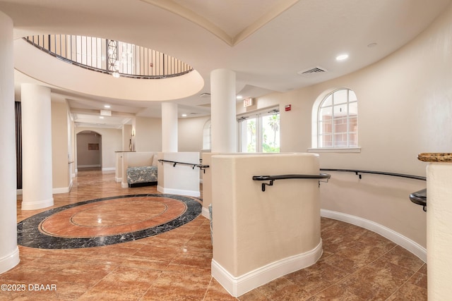 2515 S Atlantic Ave Unit 703, Daytona Beach, FL 32118 - foyer entrance with arched walkways and recessed lighting