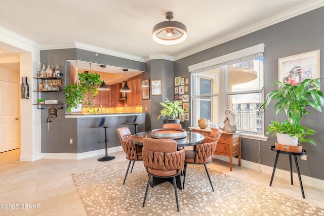2515 S Atlantic Ave Unit 703, Daytona Beach, FL 32118 - dining room featuring ornamental molding and light tile patterned floors