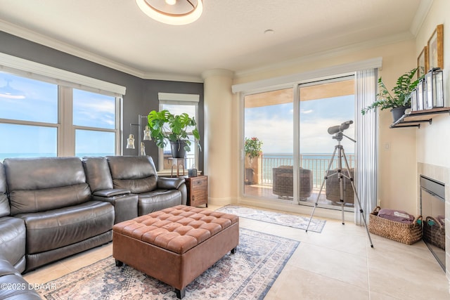 2515 S Atlantic Ave Unit 703, Daytona Beach, FL 32118 - living room with light tile patterned floors and ornamental molding