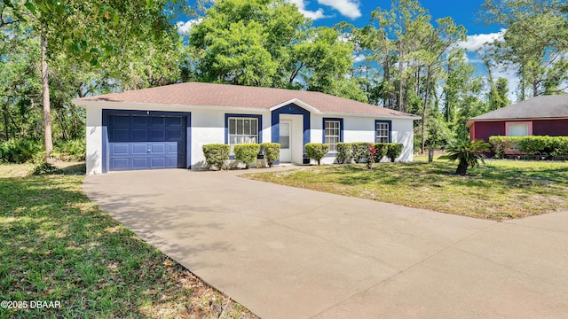 4 Starling Dr, Daytona Beach, FL 32117 - ranch-style house with a garage, a front yard, concrete driveway, and stucco siding