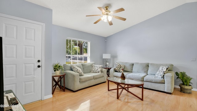4 Starling Dr, Daytona Beach, FL 32117 - living area with light wood finished floors, ceiling fan, baseboards, and lofted ceiling