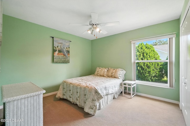 3776 Sweet Grove Ct, Port Orange, FL 32129 - carpeted bedroom with baseboards and a ceiling fan