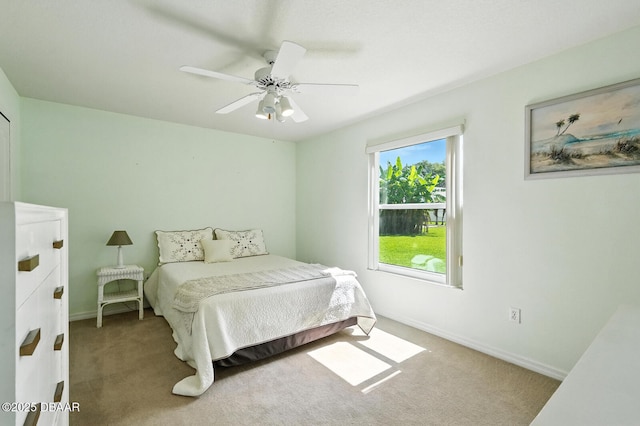 3776 Sweet Grove Ct, Port Orange, FL 32129 - carpeted bedroom with baseboards and a ceiling fan