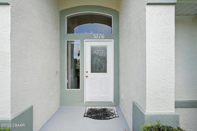 3776 Sweet Grove Ct, Port Orange, FL 32129 - property entrance featuring stucco siding