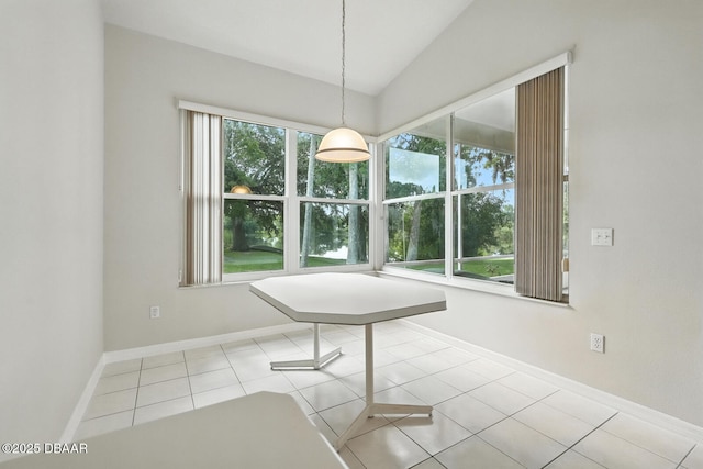 3776 Sweet Grove Ct, Port Orange, FL 32129 - unfurnished dining area with vaulted ceiling and tile patterned flooring