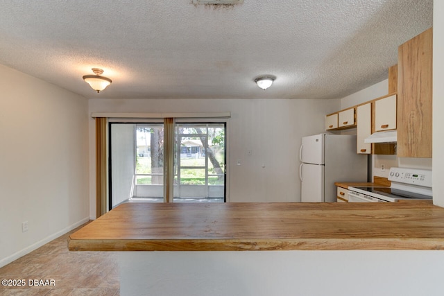188 W Sandalwood Ct, Daytona Beach, FL 32119 - kitchen featuring butcher block countertops, white appliances, a peninsula, a textured ceiling, and under cabinet range hood
