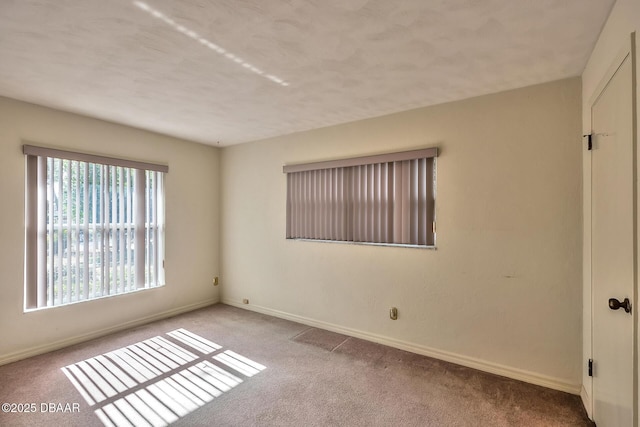 16 Red Maple Cir, Ormond Beach, FL 32174 - spare room featuring carpet floors and baseboards