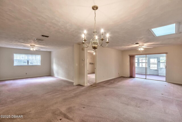 16 Red Maple Cir, Ormond Beach, FL 32174 - unfurnished room featuring light carpet, baseboards, and ceiling fan with notable chandelier