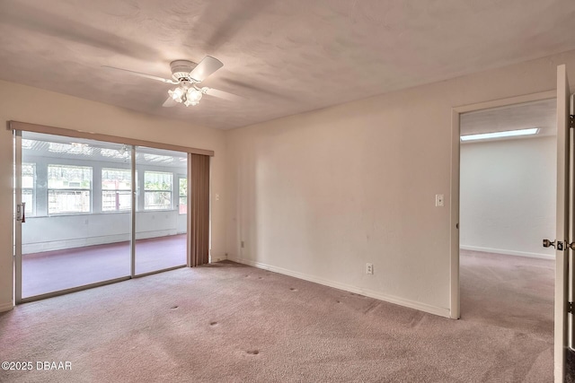 16 Red Maple Cir, Ormond Beach, FL 32174 - spare room with baseboards, carpet flooring, and ceiling fan