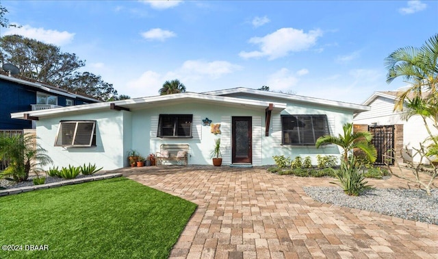 view of front of property with a front yard