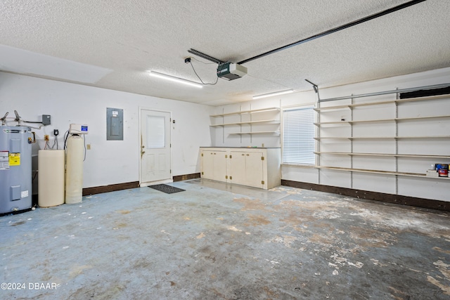 garage with water heater, a garage door opener, and electric panel