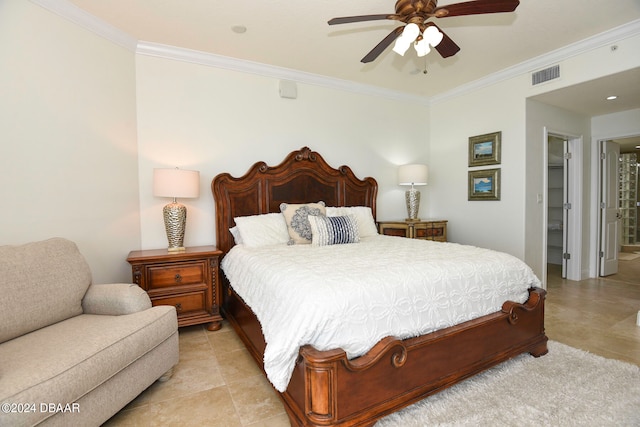 tiled bedroom featuring ornamental molding, ceiling fan, a walk in closet, connected bathroom, and a closet