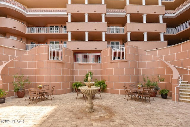 view of patio / terrace with a balcony