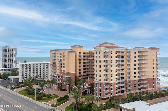 view of building exterior with a water view