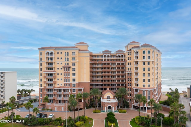 view of building exterior featuring a water view