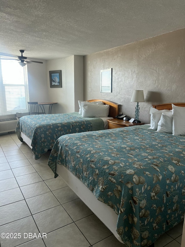 313 S Atlantic Ave Unit 221, Daytona Beach, FL 32118 - bedroom featuring tile patterned floors and a textured ceiling