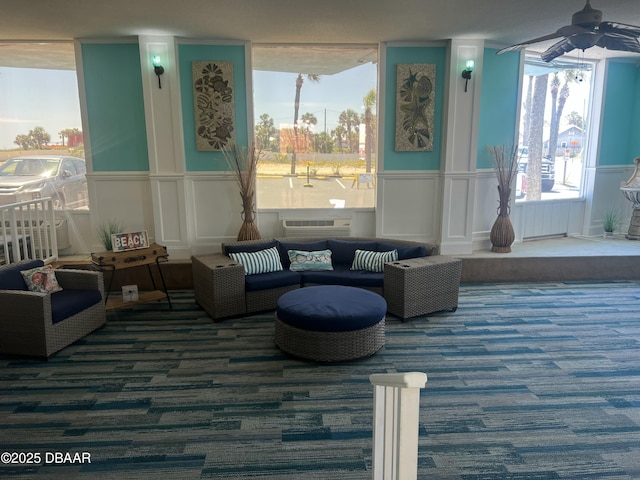 313 S Atlantic Ave Unit 221, Daytona Beach, FL 32118 - common area featuring a decorative wall and a wainscoted wall