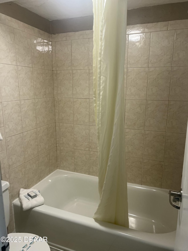 313 S Atlantic Ave Unit 221, Daytona Beach, FL 32118 - full bath with toilet and shower / bath combo with shower curtain