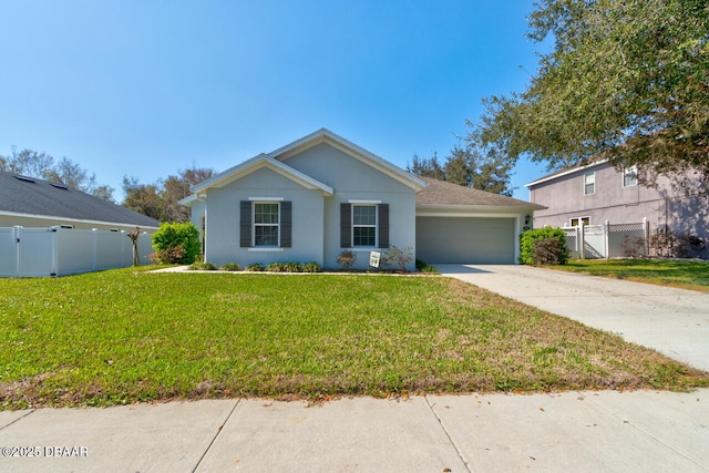 ranch-style home featuring a garage, a front yard, concrete driveway, and fence